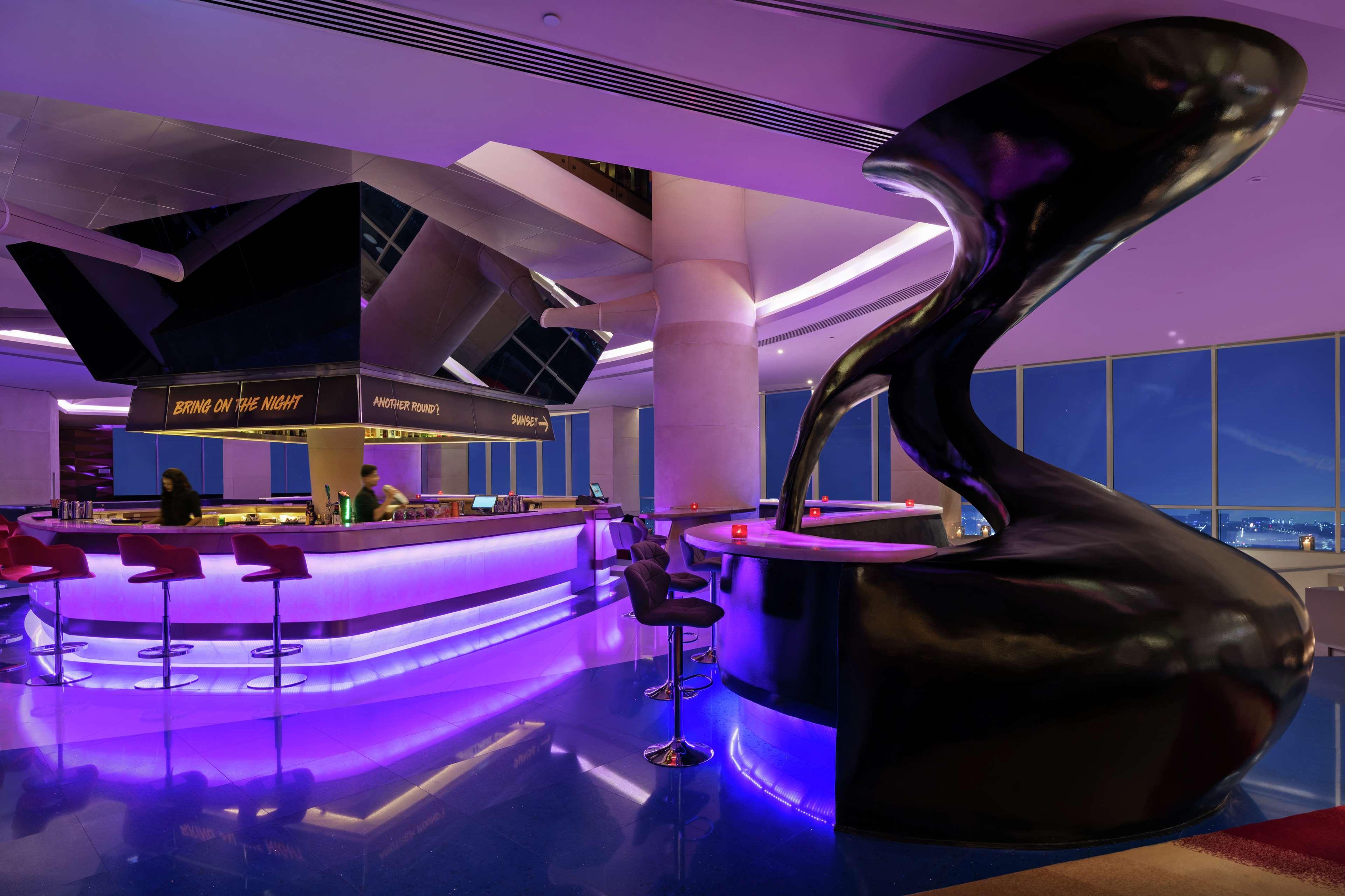 V Hotel Dubai, Curio Collection By Hilton Exteriör bild The bar at the 101 Skybar