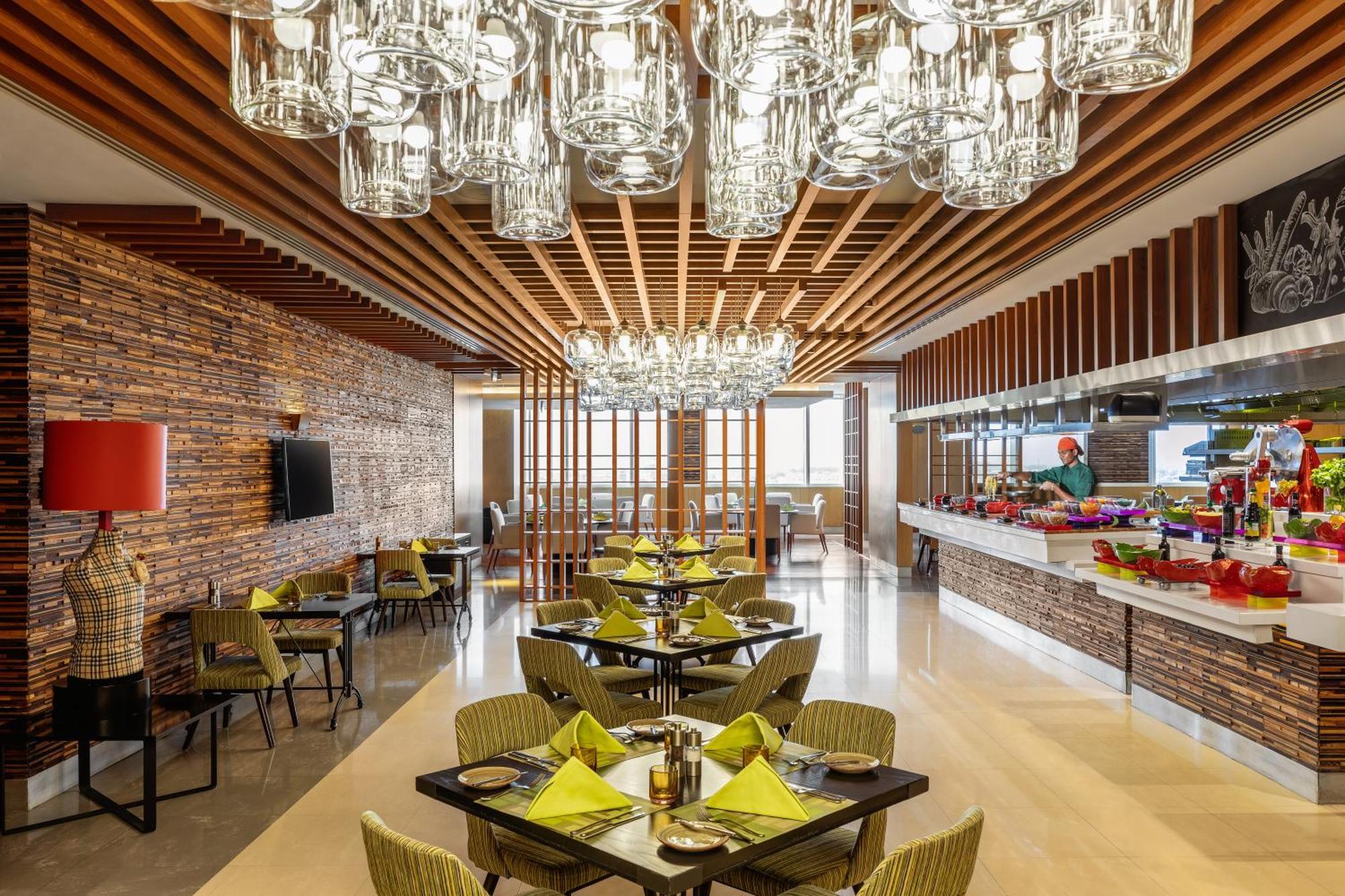 V Hotel Dubai, Curio Collection By Hilton Exteriör bild The restaurant