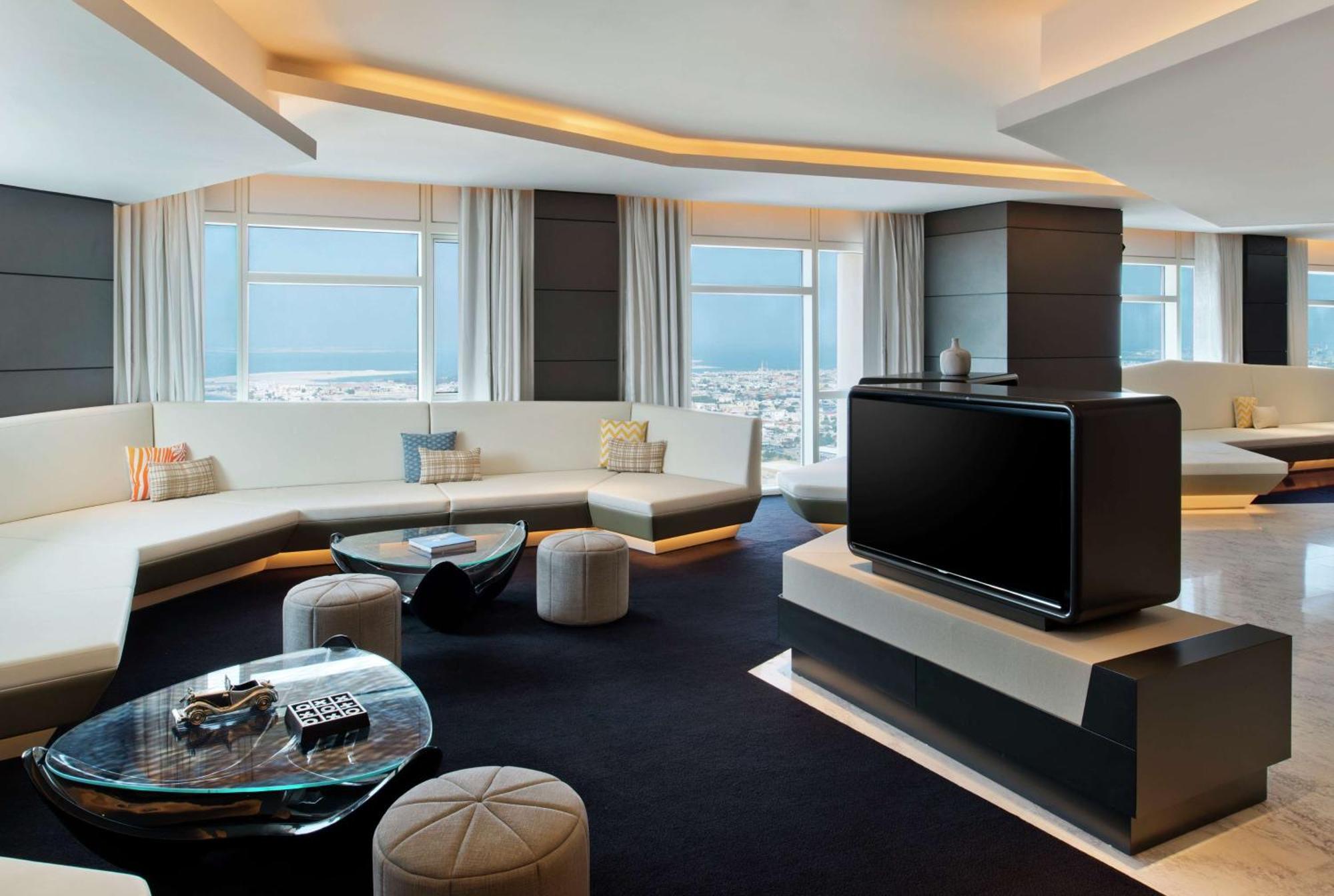 V Hotel Dubai, Curio Collection By Hilton Exteriör bild The Living Room