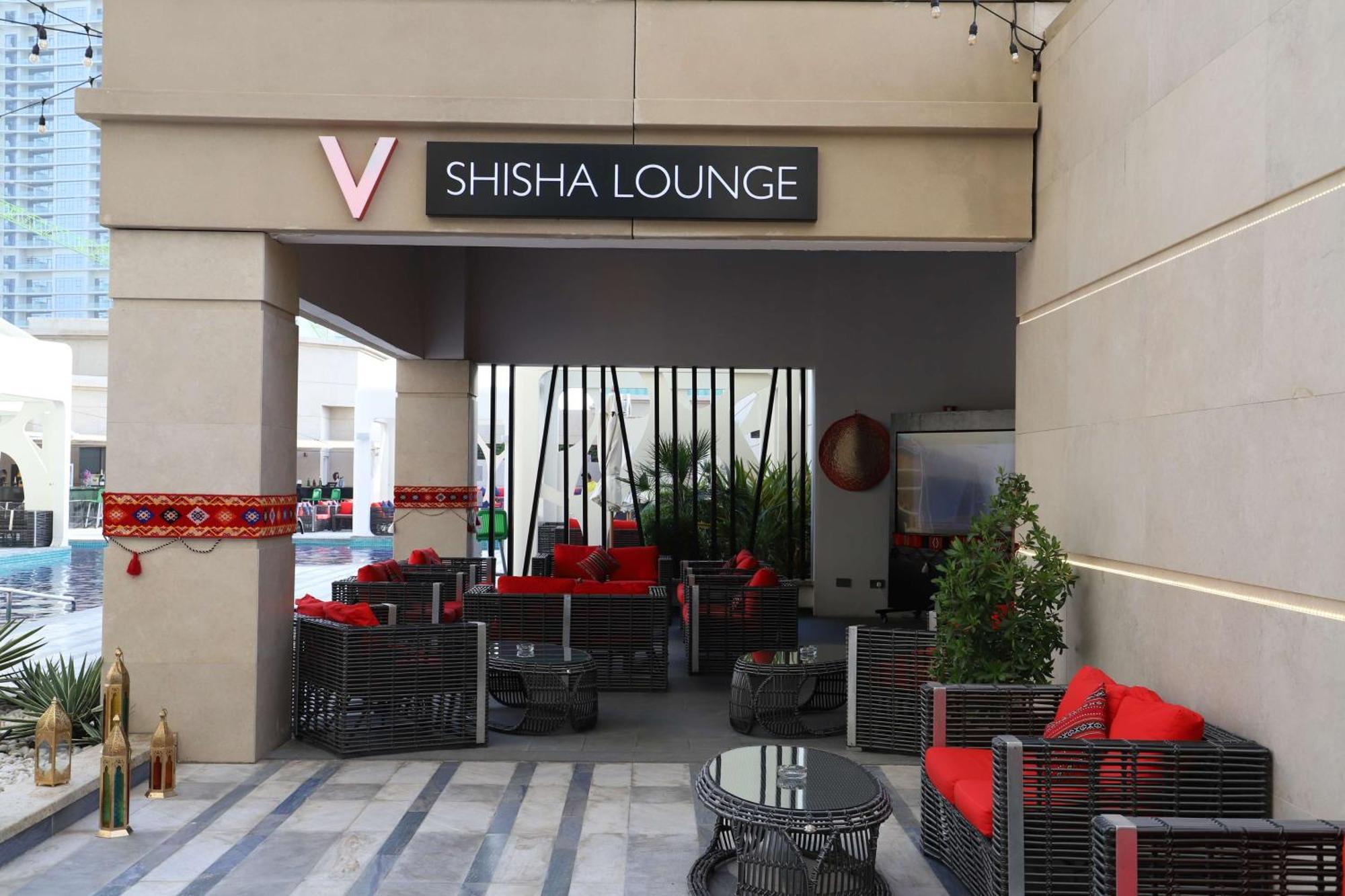 V Hotel Dubai, Curio Collection By Hilton Exteriör bild A shisha lounge in Dubai